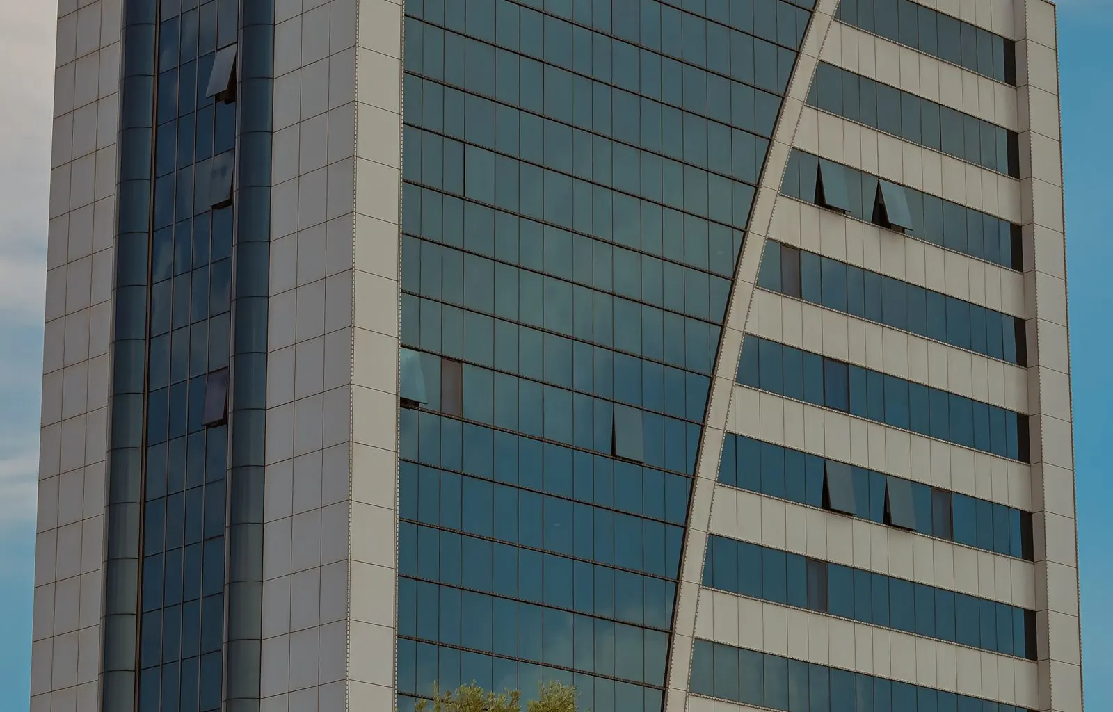 Clean modern commercial building exterior at golden hour
